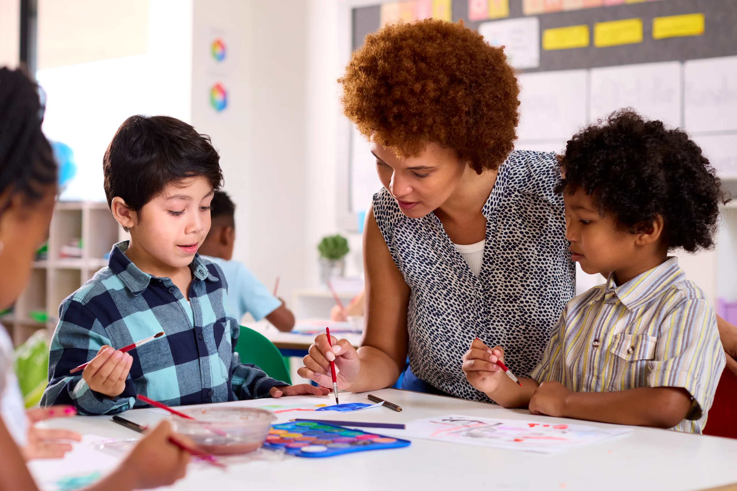 Female teacher with multi cultural elementary scho 2026 03 10 03 53 39 utc